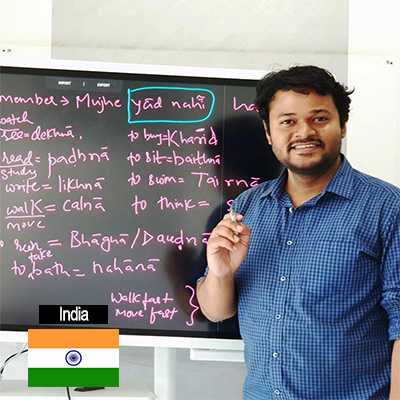 Vivek teaching a Hindi lesson in India